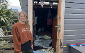 St Kilda resident Ria Stout, mid-way through the cleanup after flooding, on 7 October 2024.