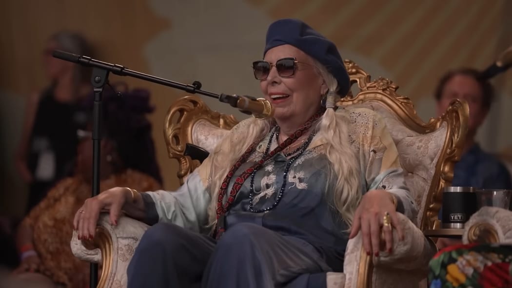 Joni Mitchell performing at the Newport Folk Festival 2022