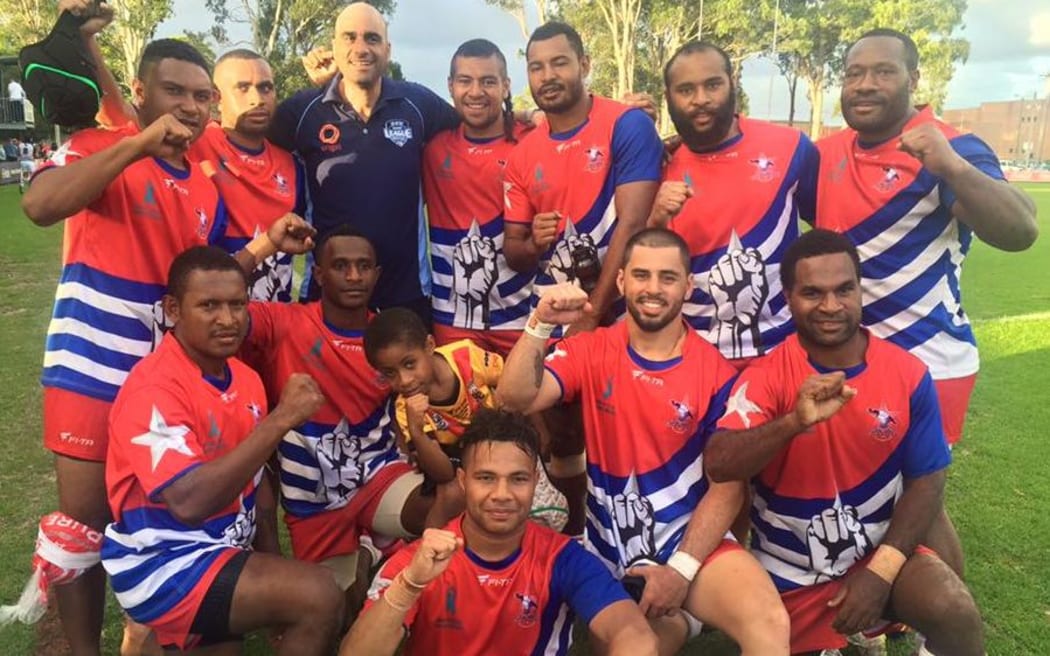The West Papua Warriors celebrate beating the Philippines development team.
