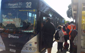 Auckland Transport staff in hi-vis vests were stationed on routes to help people find their buses.