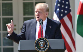 US President Donald Trump has condemned the killing of dozens of civilians in northern Syria in an apparent chemical weapons attack by Syria's air force.