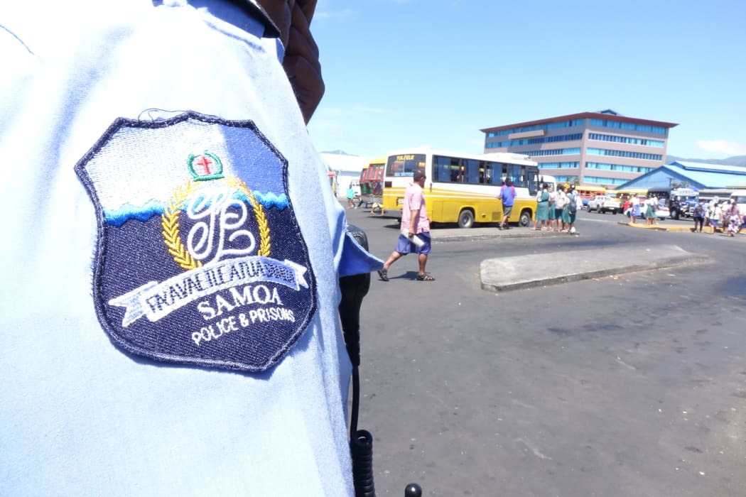 Samoa police badge bearing the country's public seal which reads "Faavae i Le Atua Samoa" which translates to English as "God be the Foundation of Samoa"