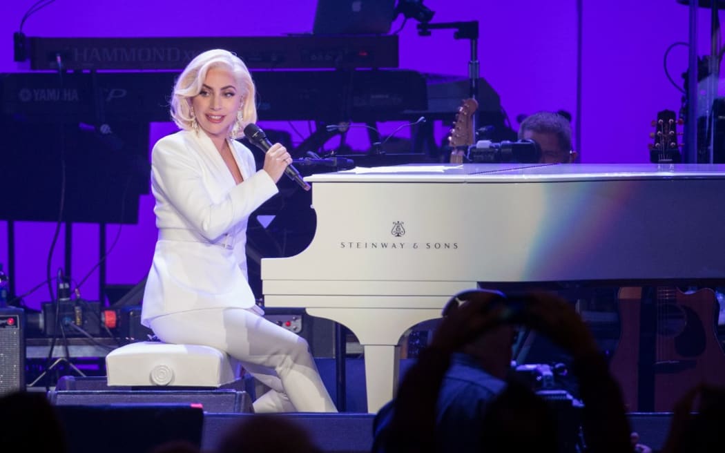 (FILES) In this file photo taken on October 21, 2017, Singer Lady Gaga performs during the Hurricane Relief concert in College Station, Texas.