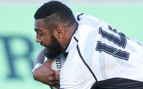 Fiji's Waisea Nayacalevu dives over to score.