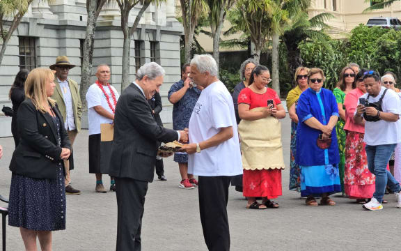 Winston Peters received a petition which calls for visas on arrival for Pacific Islanders outside Parliament on Wednesday