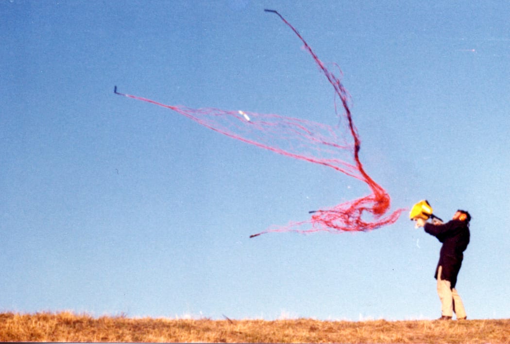 Man testing net gun