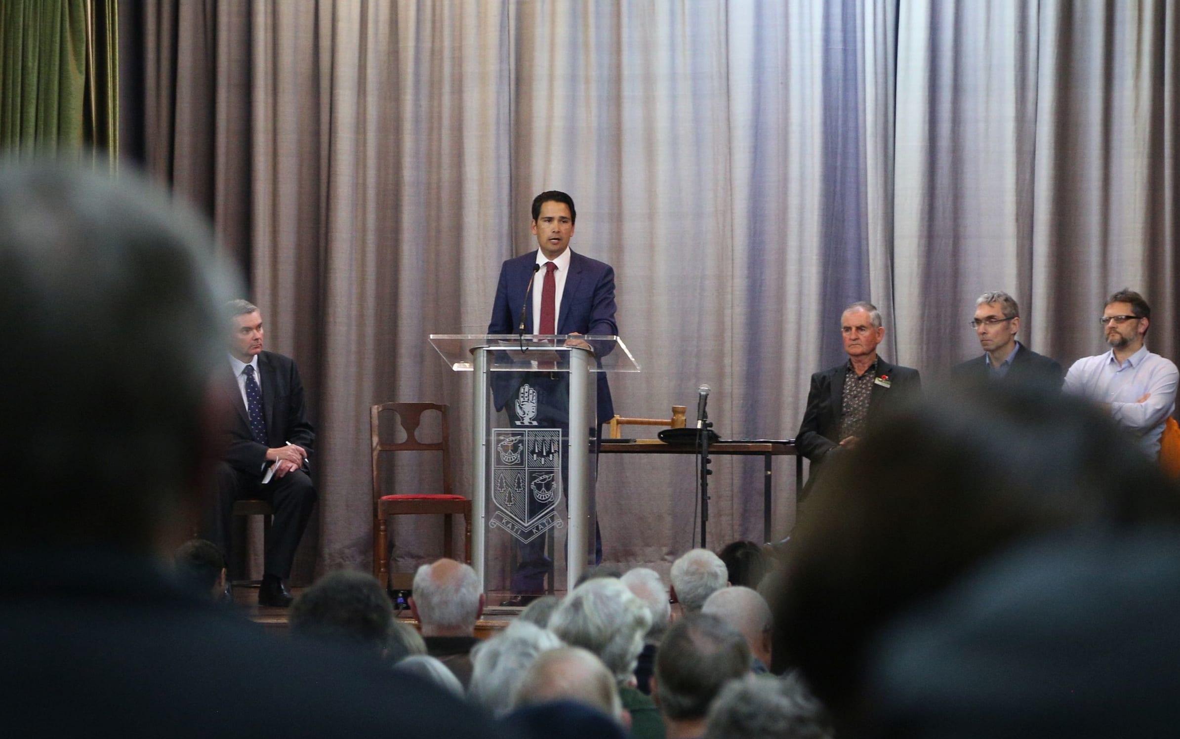 Transport minister Simon Bridges addresses the meeting.