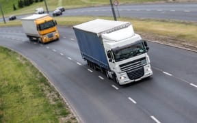 Trucks on highway.
