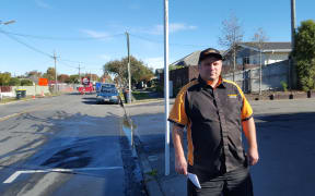Darren Carlaw outside his business The Naked Baker in North Brighton, which has been hemmed in by roadworks for months.