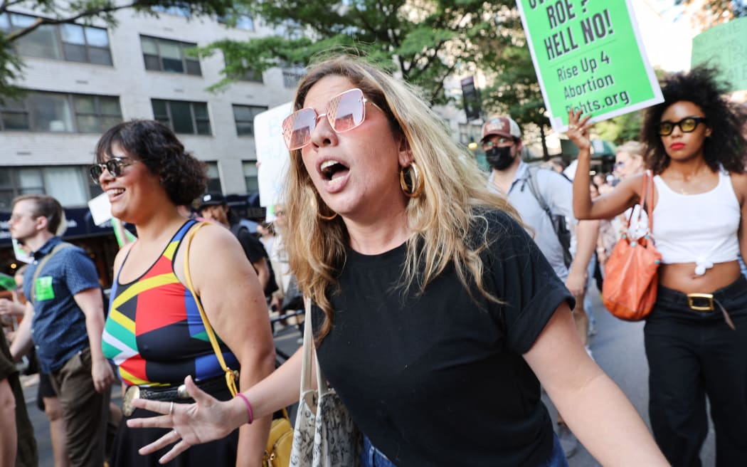 NEW YORK CITY - JUNE 24: People gather at Union Square to protest against the the Supreme Court's decision in the Dobbs v Jackson Women's Health case on June 24, 2022 in the Manhattan borough of New York City. The Court's decision in the Dobbs v Jackson Women's Health case overturns the landmark 50-year-old Roe v Wade case, removing a federal right to an abortion.   Spencer Platt/Getty Images/AFP (Photo by SPENCER PLATT / GETTY IMAGES NORTH AMERICA / Getty Images via AFP)