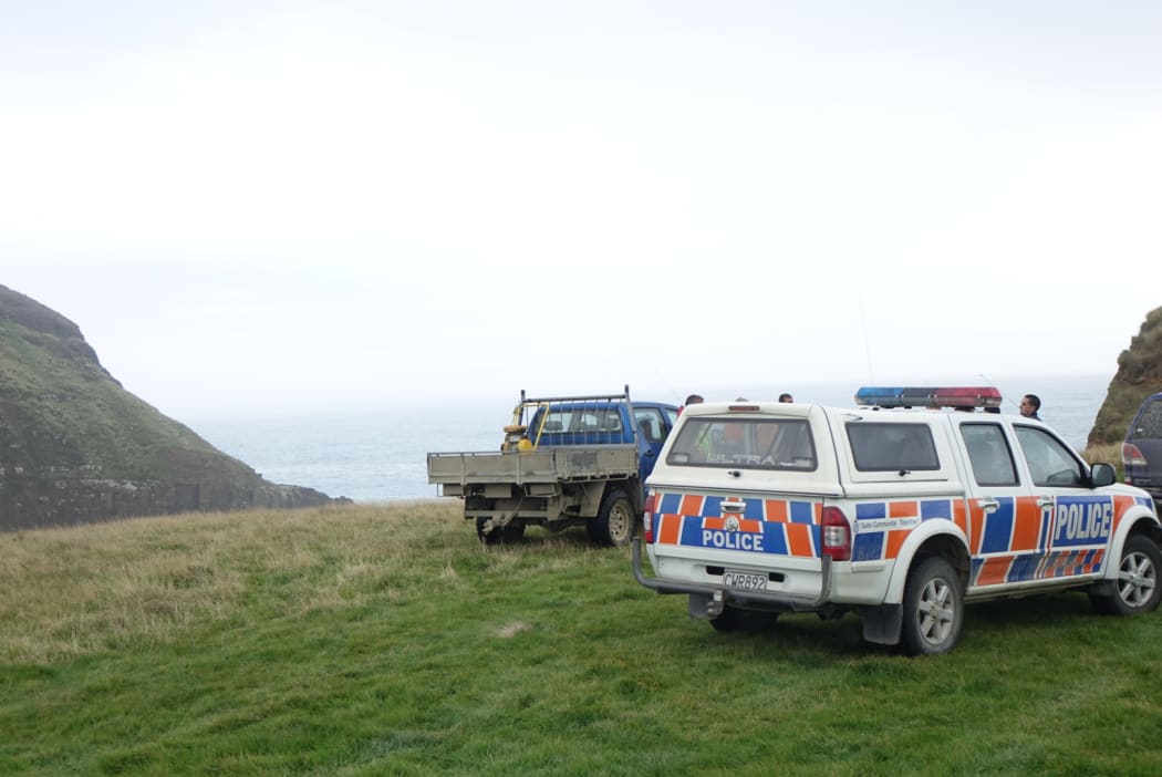 A police vehicle at Curio Bay.