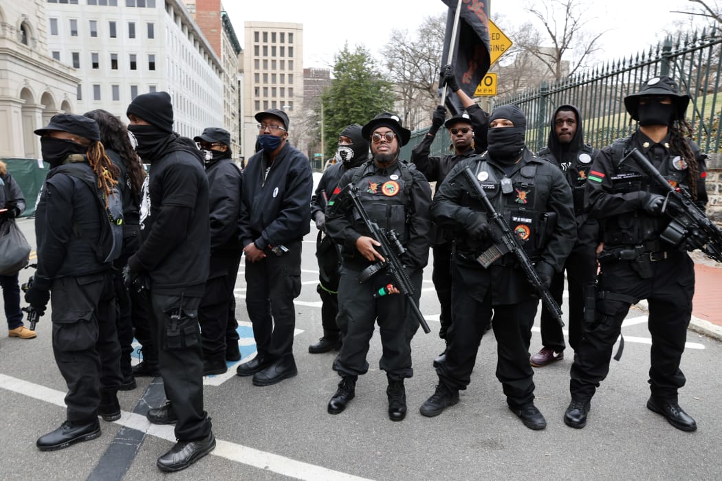 Members of the Black Panthers join other gun rights advocates in front of the State House as pro-gun supporters gather on January 18, 2021 in Richmond, Virginia. T