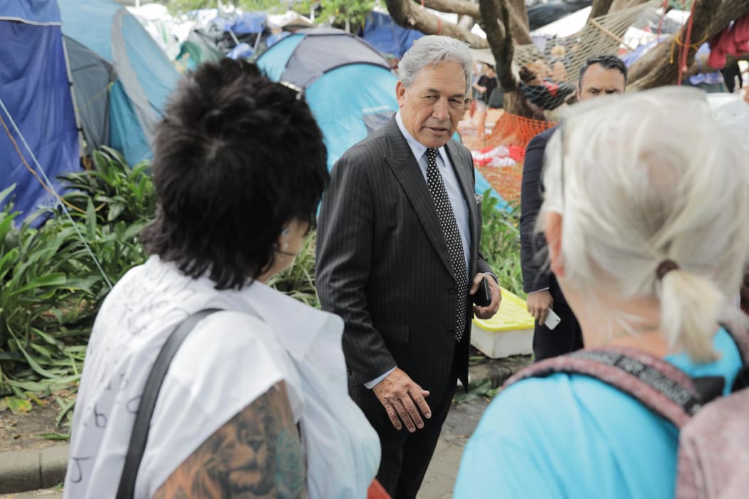 Winston Peters talks to protesters outside Parliament on 22 February 2022.