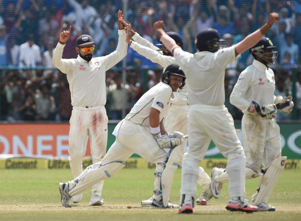 India celebrate wicket of BJ Watling during the Black Caps first test in Kanpur