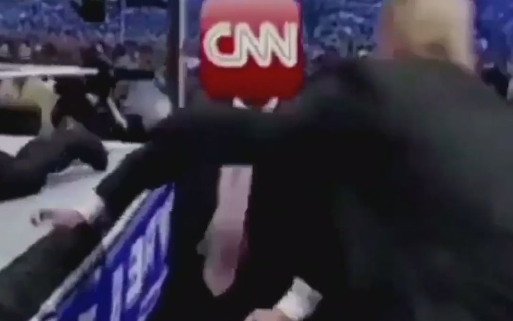US President Donald Trump has tweeted a short video clip of him wrestling a person with the CNN logo for a head.
