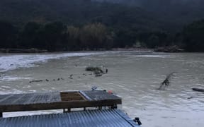 The Uawa river in flood at Tolaga Bay.