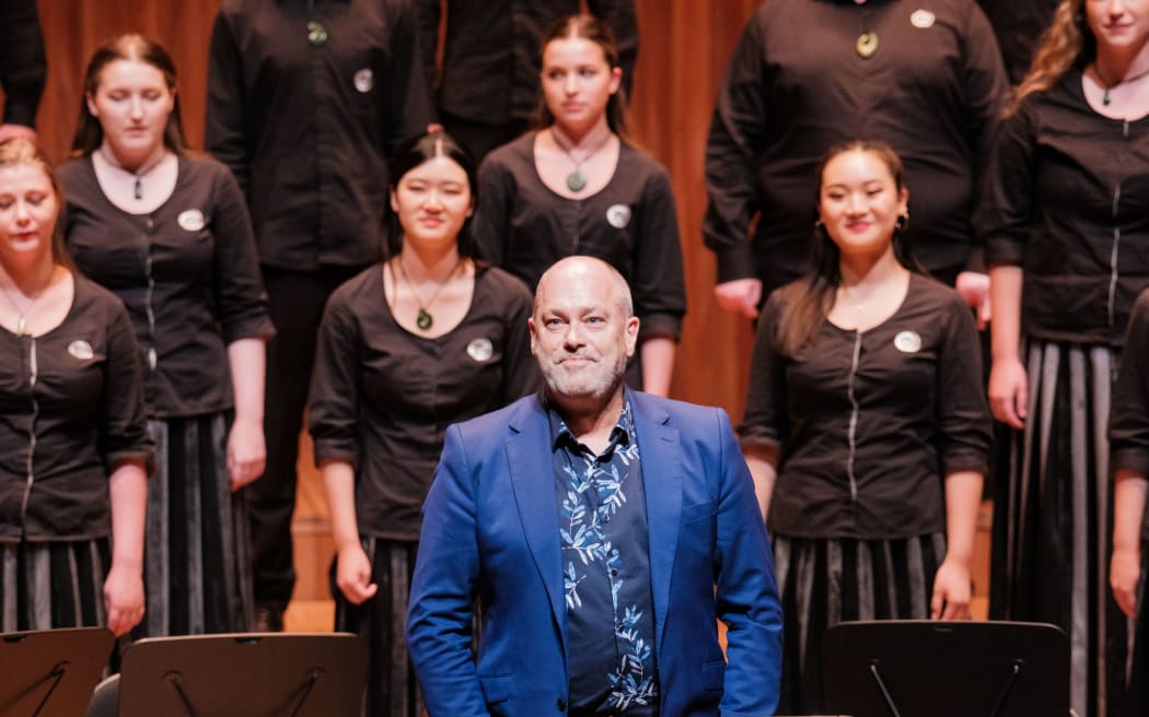 David Squire directing the NZ Youth Choir at the Sydney Opera House in December 2022.