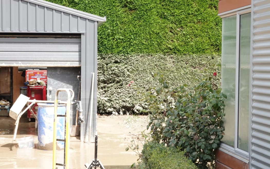 The water mark on the hedge shows how high the flood reached at Rayner Croad's house during Cyclone Gabrielle.