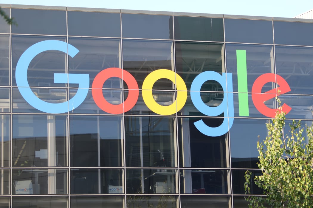 The logo of Google on the facade of headquarter of the parent company Alphabet.