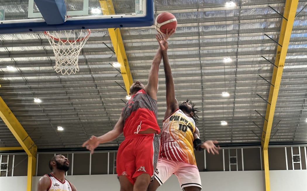 Pacific Airtime – Papua New Guinea’s Coni Muri (No.10) contests for the ball against New Caledonia’s Jean Sebastien Chevrin in their Pacific Games quarterfinal match. The Cagous went on to win 87-78 setting up a semi-final with Fiji. Friendship Hall 22 November 2023.