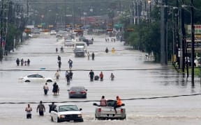 Tropical Storm Harvey has brought intense rainfall and flooding "beyond anything experienced" in the state, the National Weather Service says.