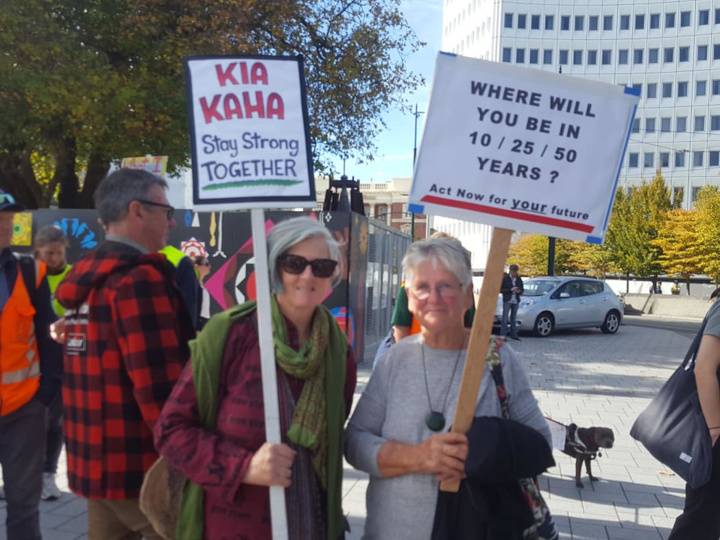 Annie Whitla and partner Soren O'Neil are at Christchurch's march to show support for young people.
