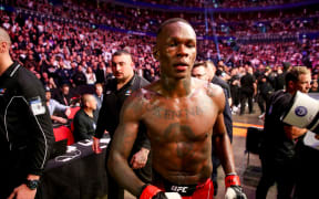 A dejected looking Israel Adesanya post-fight.