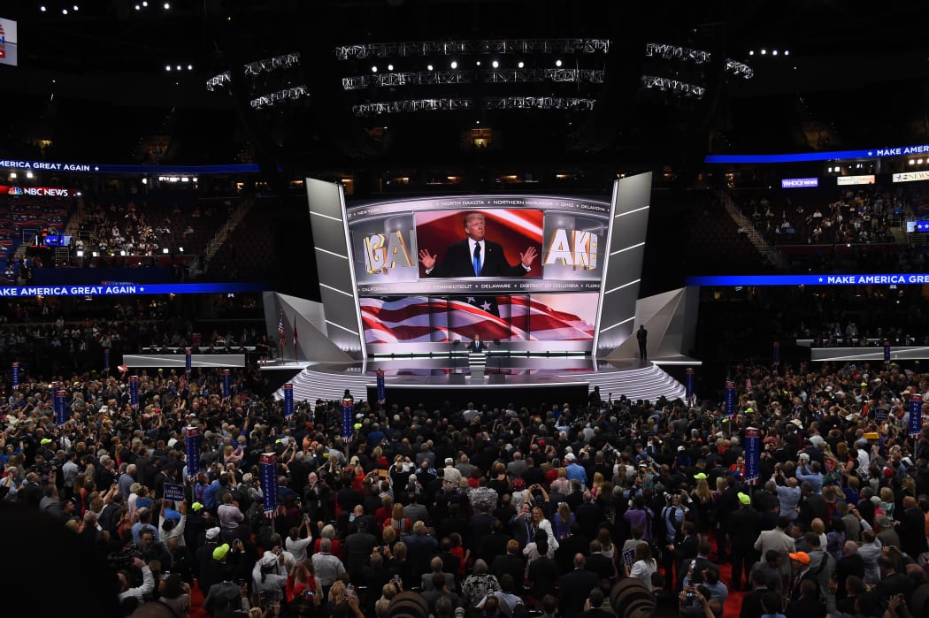 Presumptive Republican presidential candidate Donald Trump introduces Melania (out of frame) at the convention in Cleveland, Ohio