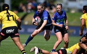 Blues first five-eighth Krysten Cottrell in action against Hurricanes Poua.