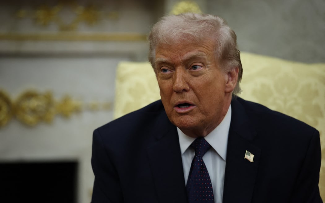 US President Donald Trump speaks during a bilateral meeting with German Chancellor Friedrich Merz in the Oval Office at the White House on March 3, 2026 in Washington, D.C. Trump is meeting with the German Chancellor just days after the U.S. and Israel launched widespread attacks on Iran, killing Iran?s Supreme Leader Ayatollah Ali Khamenei and other senior leaders in air strikes across the region. Credit: Samuel Corum / Pool via CNP *** Local Caption *** 68209122 (Photo by Samuel Corum - Pool via CNP / Consolidated News Photos / dpa Picture-Alliance via AFP)