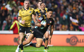 Chiefs fullback Solomon Alaimalo dots down in the first half against the Hurricanes.