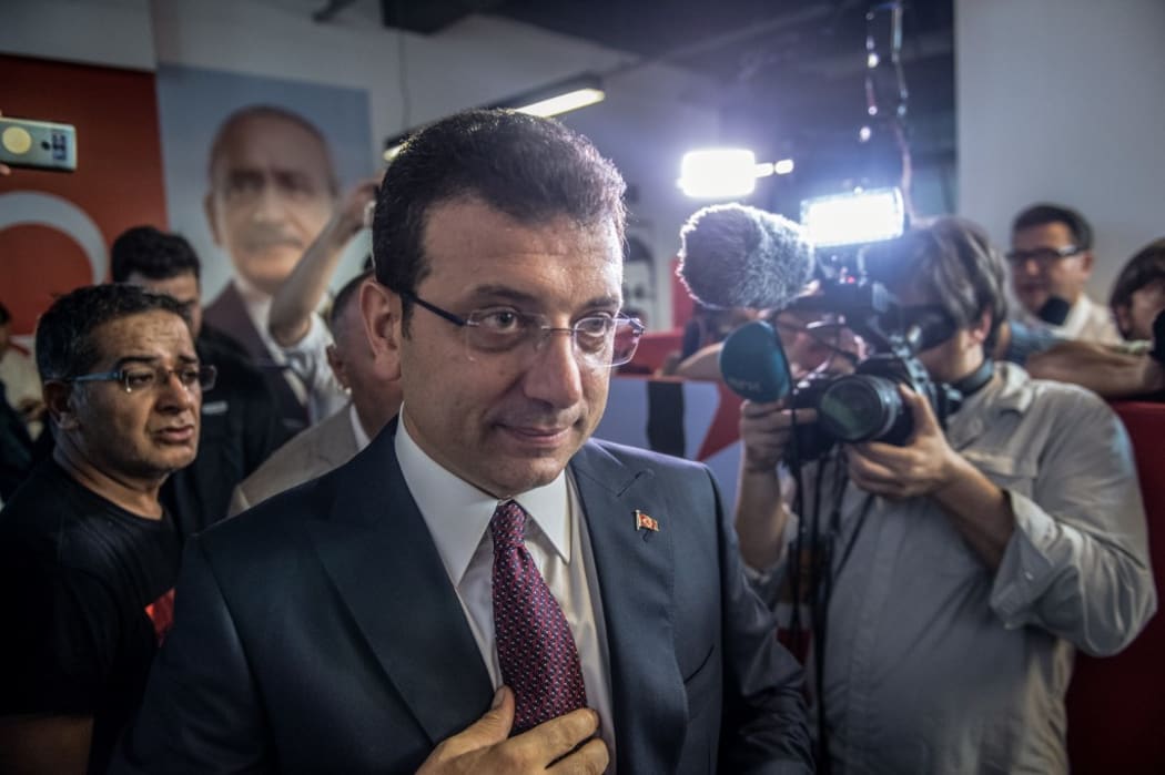 Ekrem Imamoglu, candidate of the secular opposition Republican People's Party (CHP), arrives to make his victory speech.