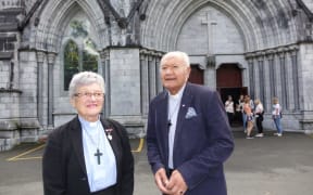 Archdeacon Andy Joseph and his wife, Ramari Joseph, also an Anglican priest outside the cathedral which is one of Nelson's top ranked tourist attractions.