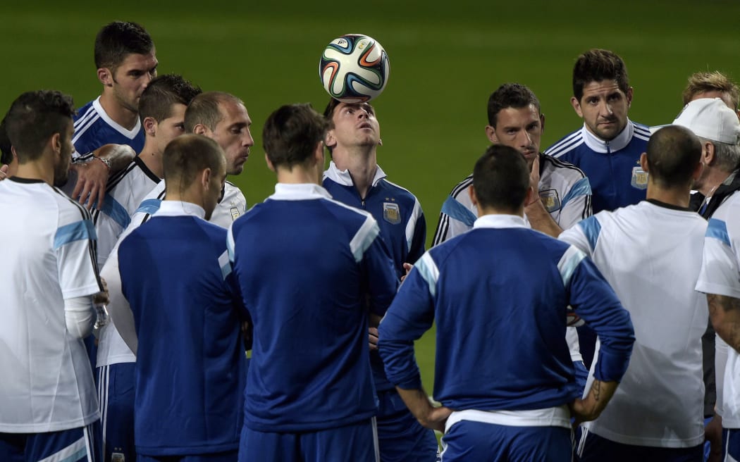 Argentina forward Lionel Messi, centre, with the team at a training session.