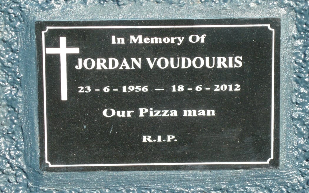 A memorial plaque to slain Paeroa pizza shop owner Jordan Voudouris.