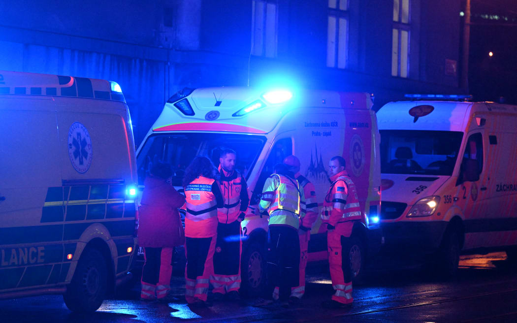 Medical personnel near the Charles University in central Prague where a gunman killed 14 people on December 21, 2023