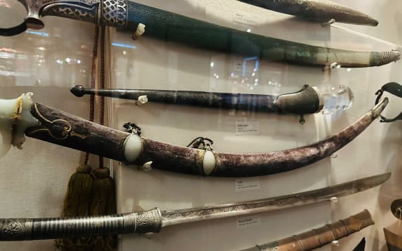 Tūhura Otago Museum has refuted claims a sword (middle) in its collection had any connection to 10th Sikh Guru Gobind Singh.