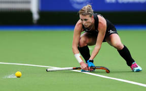 Emily Gaddum playing for the Black Sticks at the 2014 Glasgow Commonwealth Games.