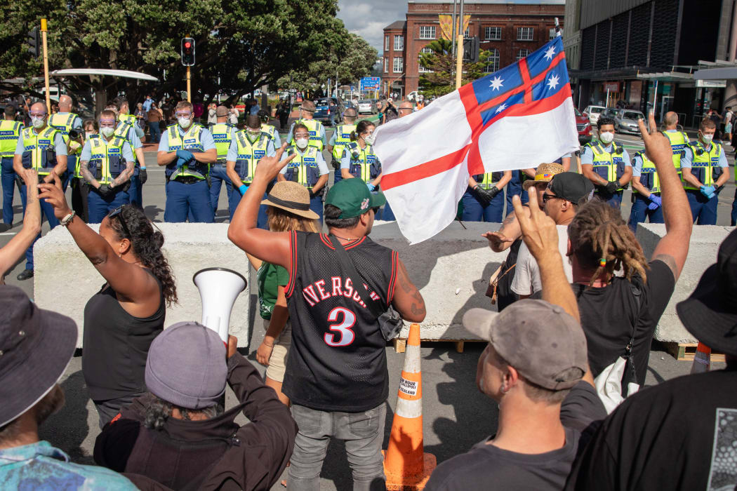 Protestors and Police standoff as police move concrete barricades