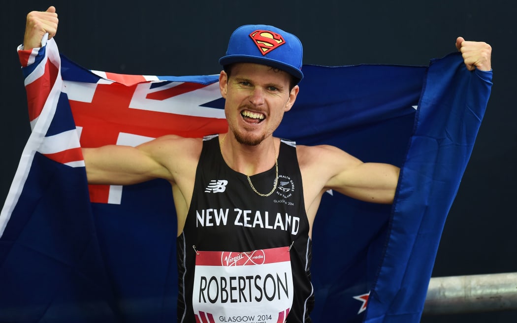 New Zealand's Zane Robertson after winning the bronze medal in the Men's 5000 metre final. Track and Field at Hampden Park. Glasgow Commonwealth Games 2014. Sunday 27 July 2014. Scotland. Photo: Andrew Cornaga/www.Photosport.co.nz