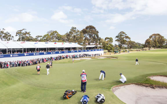 General view with gallery at the 18th hole at Kingston Heath Golf Club, Melbourne Australia.