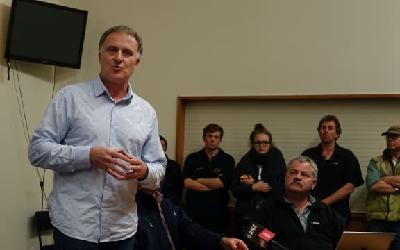 Geoff Gwyn speaks at the meeting.