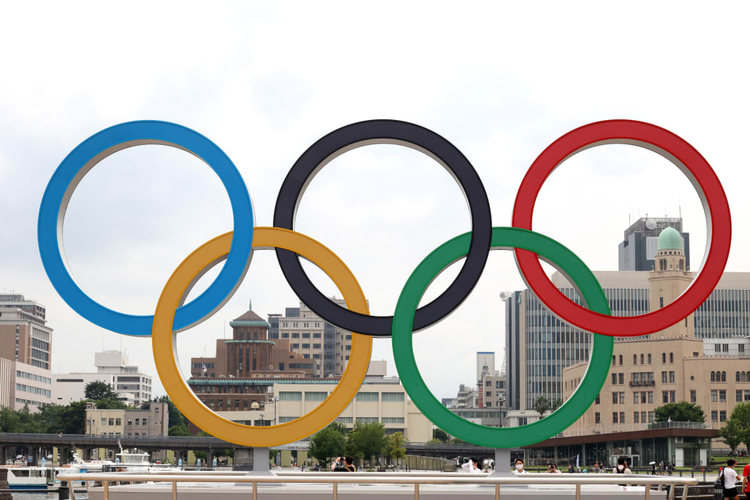 June 30, 2021, Yokohama, Japan - A large monument of the Olympic rings is displayed at a port city of Yokohama, suburban Tokyo on Wednesday, June 30, 2021 as the Olympic torch relay is held at the city.