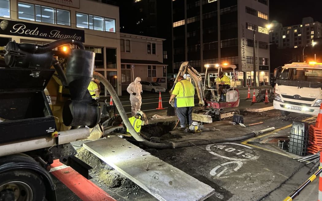 Contractors are working into the night to fix a drinking water pipe that burst on Thorndon Quay earlier on Tuesday, 29 April 2025.