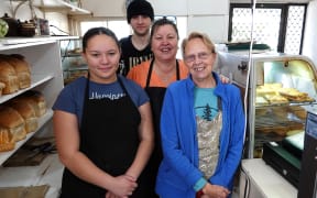 A few of the Hikurangi staff, from left, Destiney, Ethan, manager Lenore Jellick, and Jenny.
