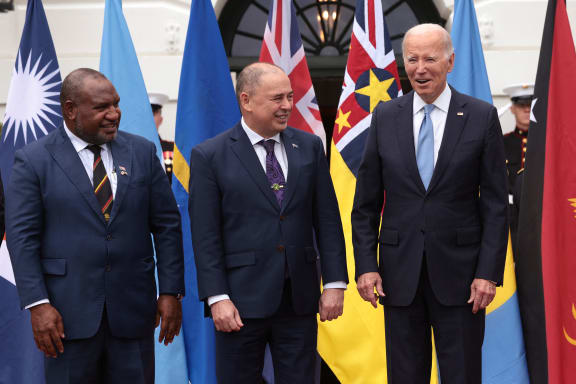 WASHINGTON, DC - SEPTEMBER 25: U.S. President Joe Biden (R) stands with Prime Minister of the Cook Islands Mark Brown (C) and Prime Minister of Papua New Guinea James Marapeand as they participate in a group photo with other leaders at the Pacific Islands Forum (PIF) as part of the U.S.-Pacific Islands Forum Summit at the White House on September 25, 2023 in Washington, DC. President Biden and senior administration officials are meeting with Pacific Islands leaders to discuss regional corporation on climate change, economic growth and regional security.   Win McNamee/Getty Images/AFP (Photo by WIN MCNAMEE / GETTY IMAGES NORTH AMERICA / Getty Images via AFP)