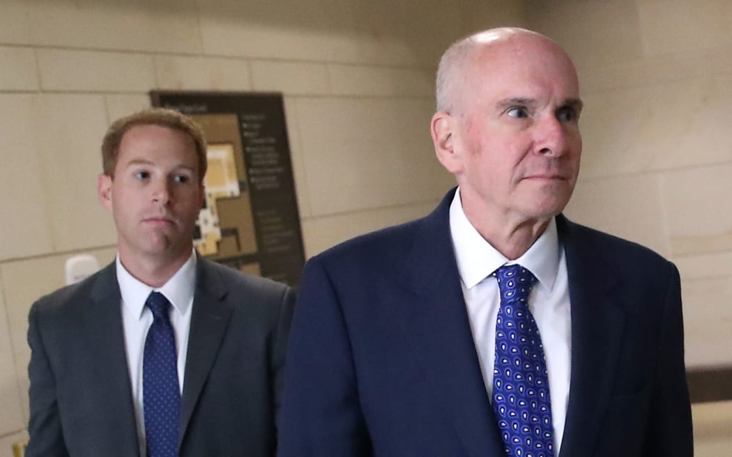 Michael McKinley, former senior adviser to Secretary of State Mike Pompeo, walks away from a closed door hearing at the US Capitol on October 16, 2019 in Washington, DC. He testified before the House Intelligence, Foreign Affairs and Oversight committees as part of impeachment investigations.