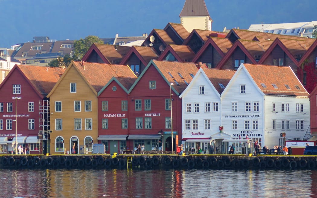 Photo of row of colourful buildings beside the water, Bergen, Norway