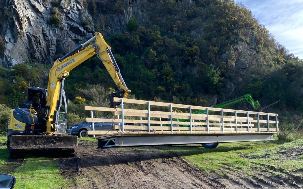 Installing the bridge, sponsored by Rotary
