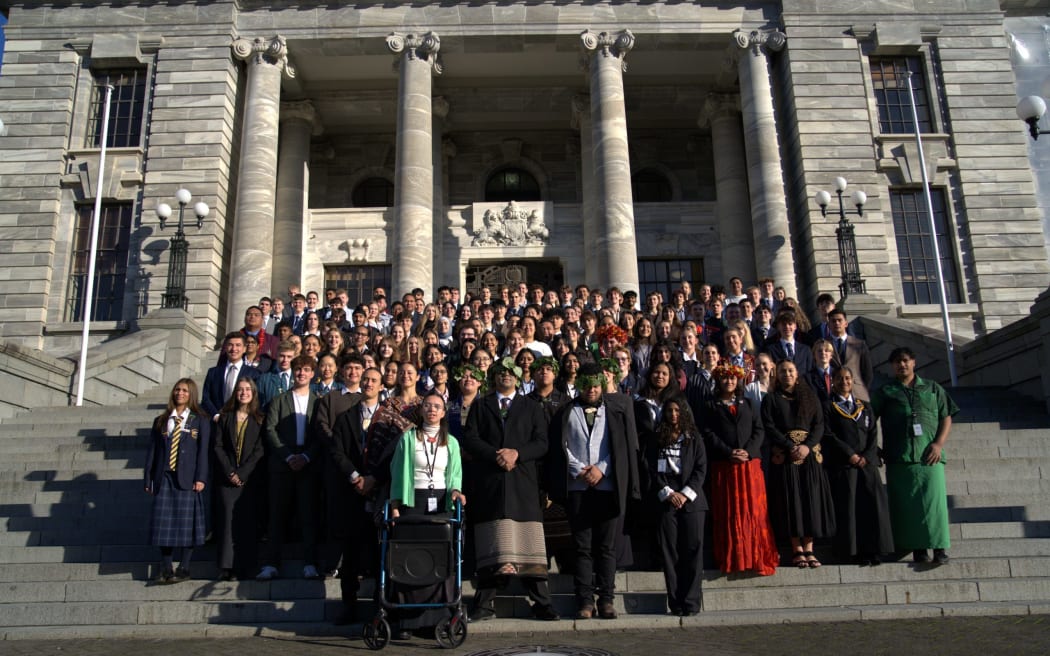 Youth MPs gather on Parliament's steps in Wellington.